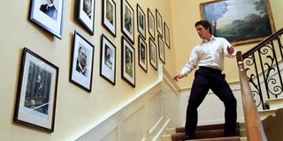 Hugh Grant dancing on stairs in Love Actually