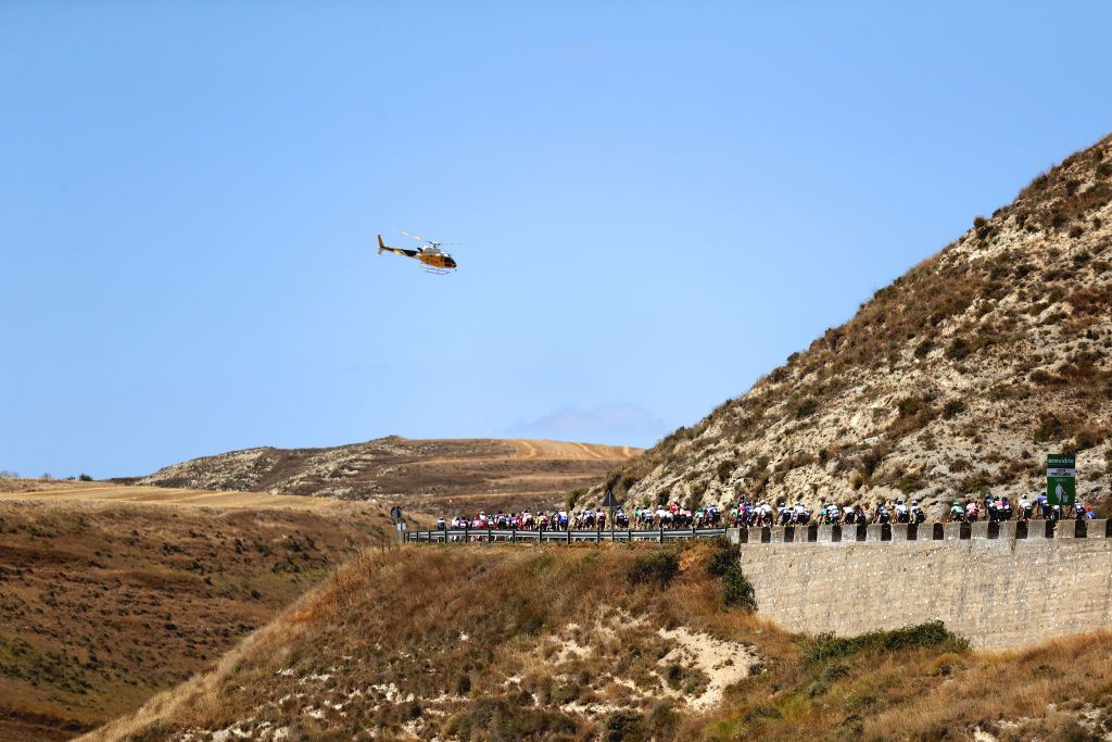 ESPINOSA DE LOS MONTEROS SPAIN AUGUST 16 A general view of the peloton during the 76th Tour of Spain 2021 Stage 3 a 2028km stage from Santo Domingo de Silos to Espinosa de los Monteros Picn Blanco 1485m lavuelta LaVuelta21 CapitalMundialdelCiclismo on August 16 2021 in Espinosa de los Monteros Spain Photo by Gonzalo Arroyo MorenoGetty Images