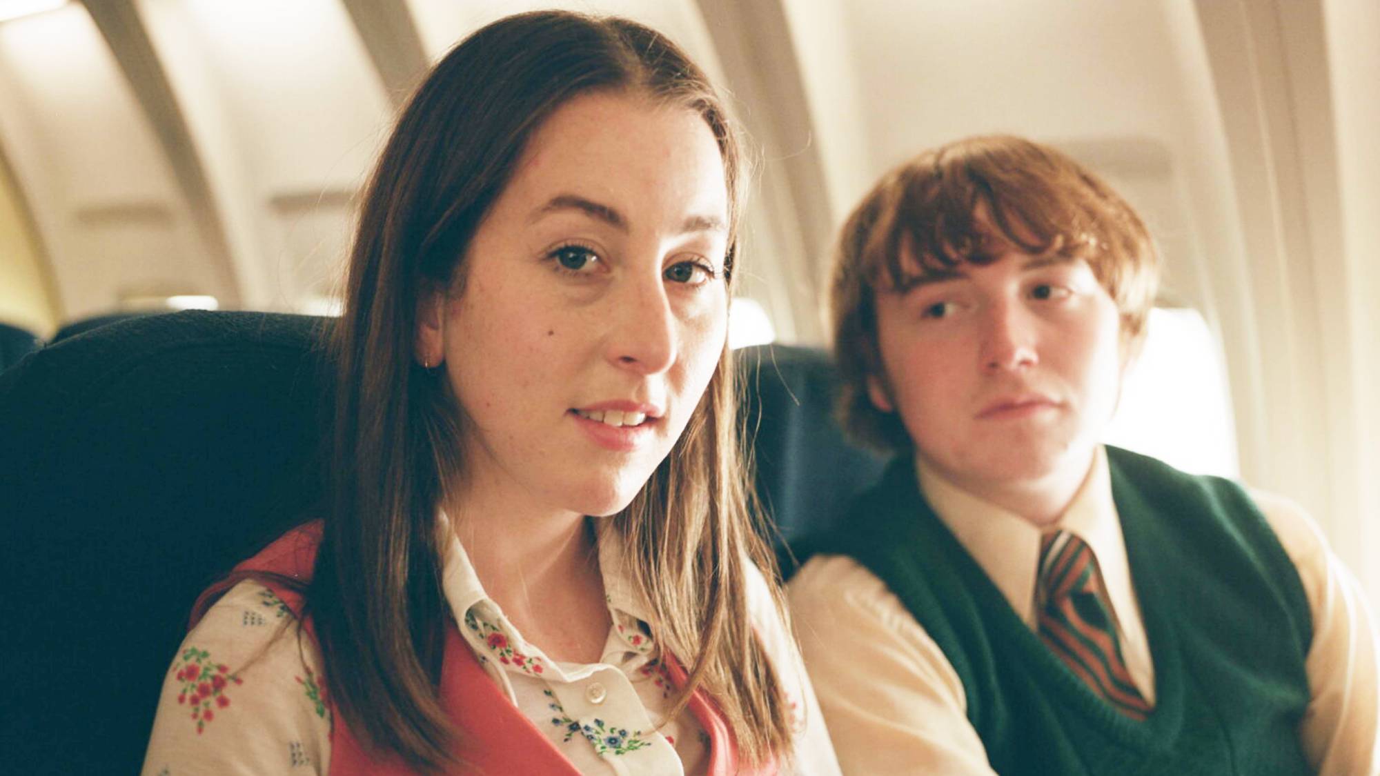 (L-R) Alana Haim as Alana Kane and Cooper Hoffman as Gary Valentine in "Licorice Pizza" now streaming on Prime Video