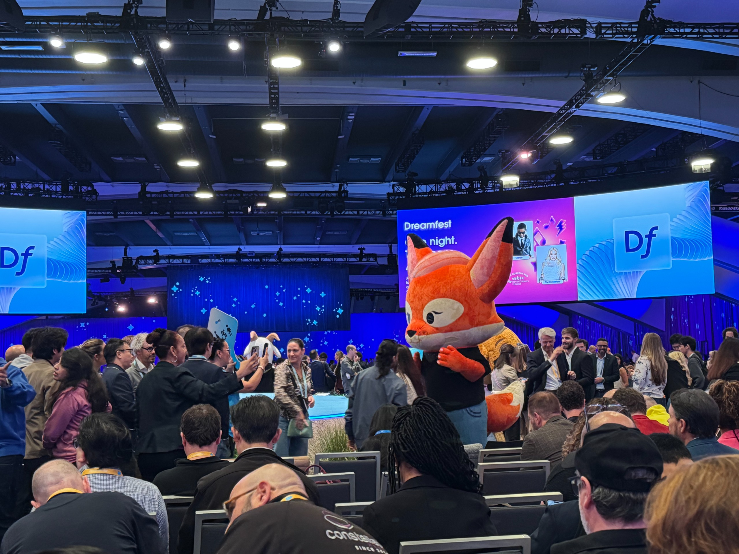 Brandy the Fox Salesforce mascot pictured with attendees at Dreamforce 2026 at the Moscone Center, San Francisco.