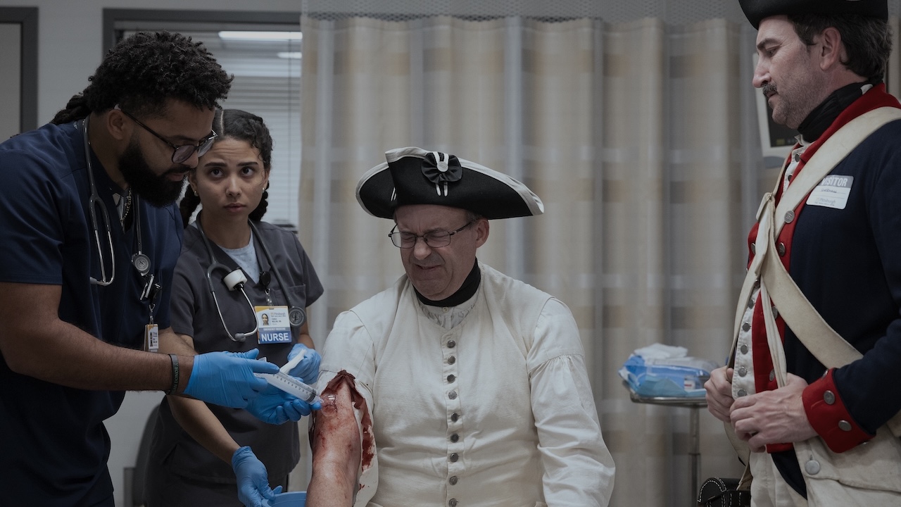 Donnie treating a historical reenactor who needs stitches in The Pitt Season 2x12