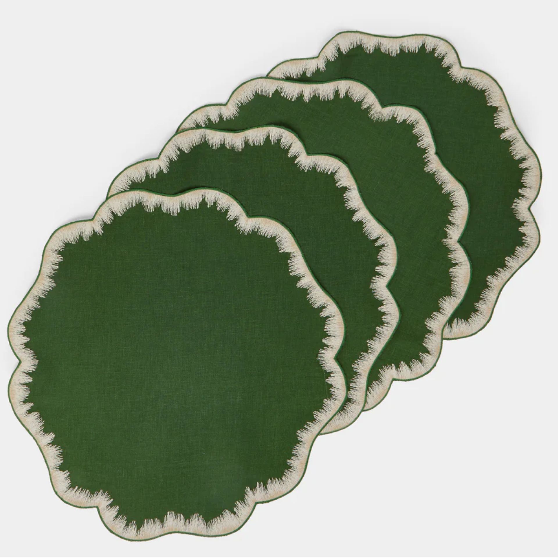 A group shot of 4 Valver embroidered placemats