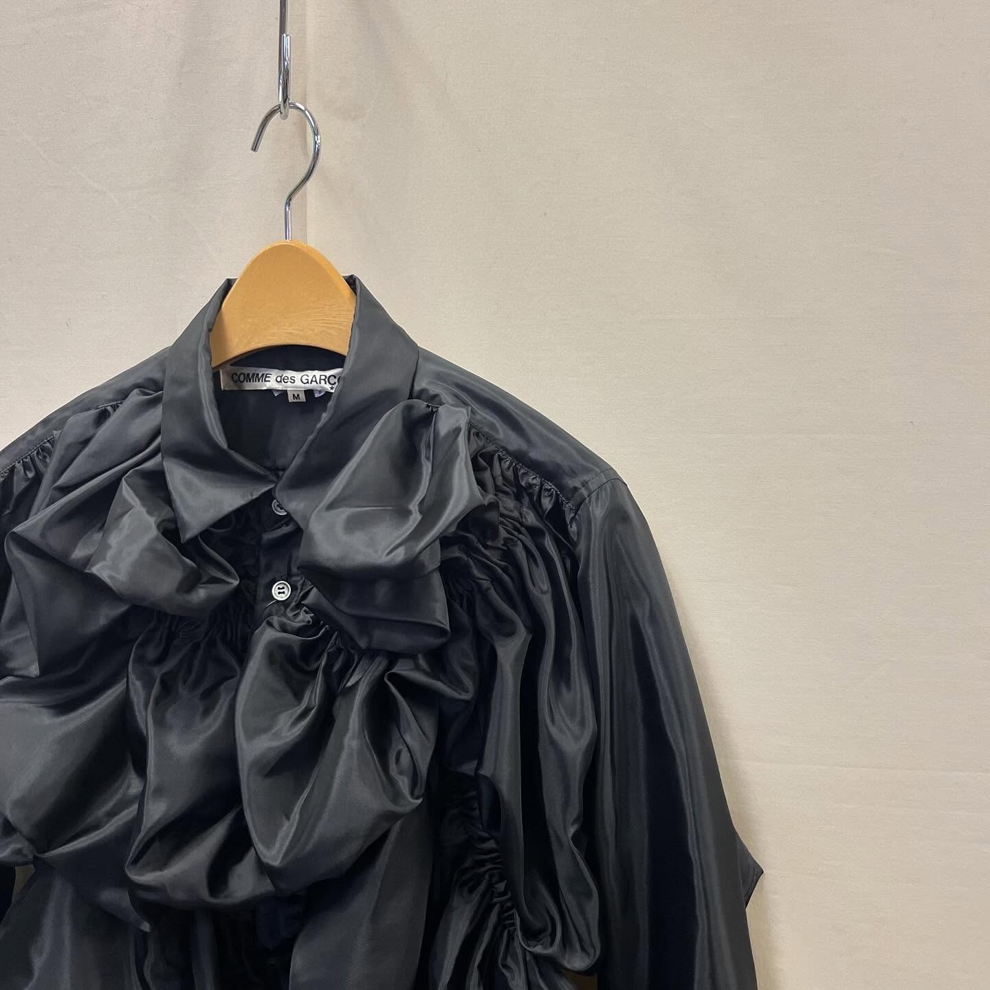 Photo of black Comme des Garcons vintage clothes in Tokyo store.
