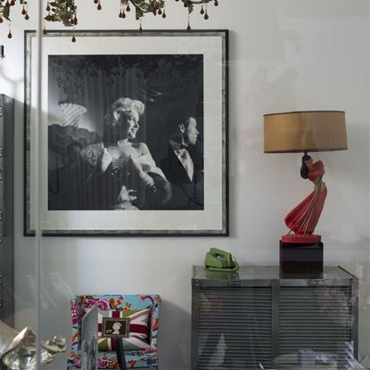 living room with large photoframe on white wall