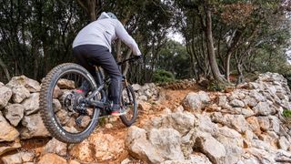 e-MTB Rider on a rocky trail using Shimano Auto Shift system