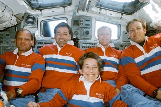 Mary Cleave poses on the aft flight deck of space shuttle Atlantis with her STS-30 crewmates: Norm Thagard, Ronald Grabe, David Walker and Mark Lee.