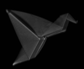 A self-folded polymer crane, just a fraction of a millimeter in width. Jun-Hee Na, Hayward Research Group,