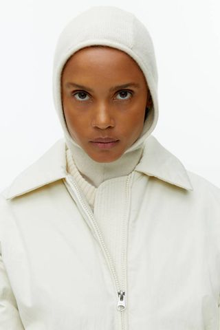 iceland fashion - woman wearing white cashmere hood