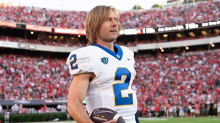 Chad Powers (Glen Powell) in his football jersey in the "Chad Powers" season finale