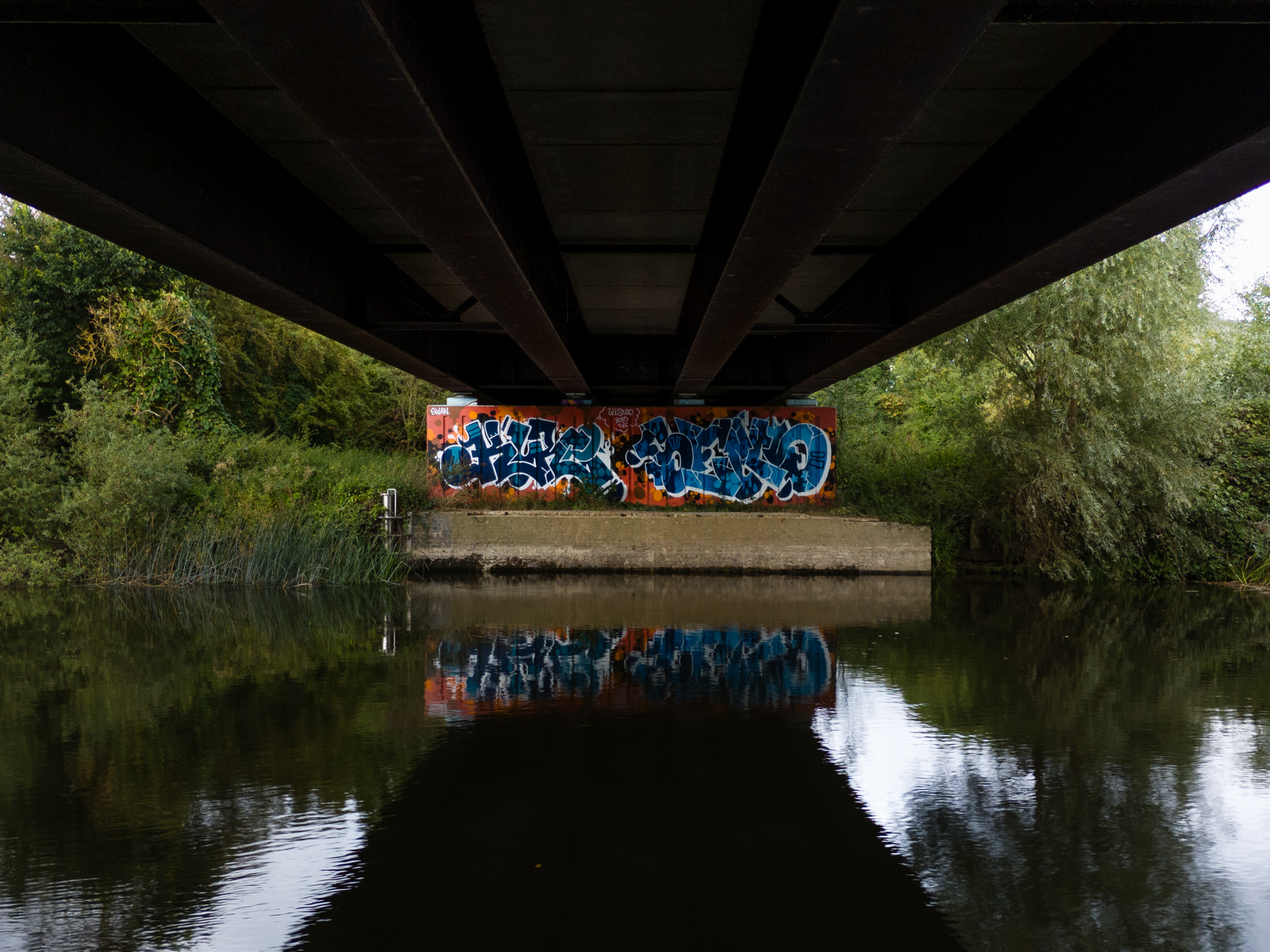 Photo of  graffiti under a bridge taken with the DJI Mini 4 Pro