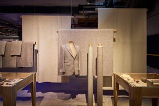 Suit jacket and textile in grey felt by Christien Meindertsma