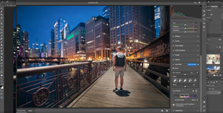 Photo of man walking in docks area being edited in Photoshop