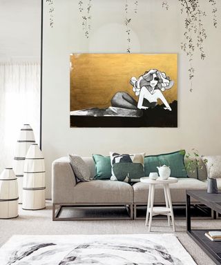 A minimalist living room with Japandi style artwork and furniture