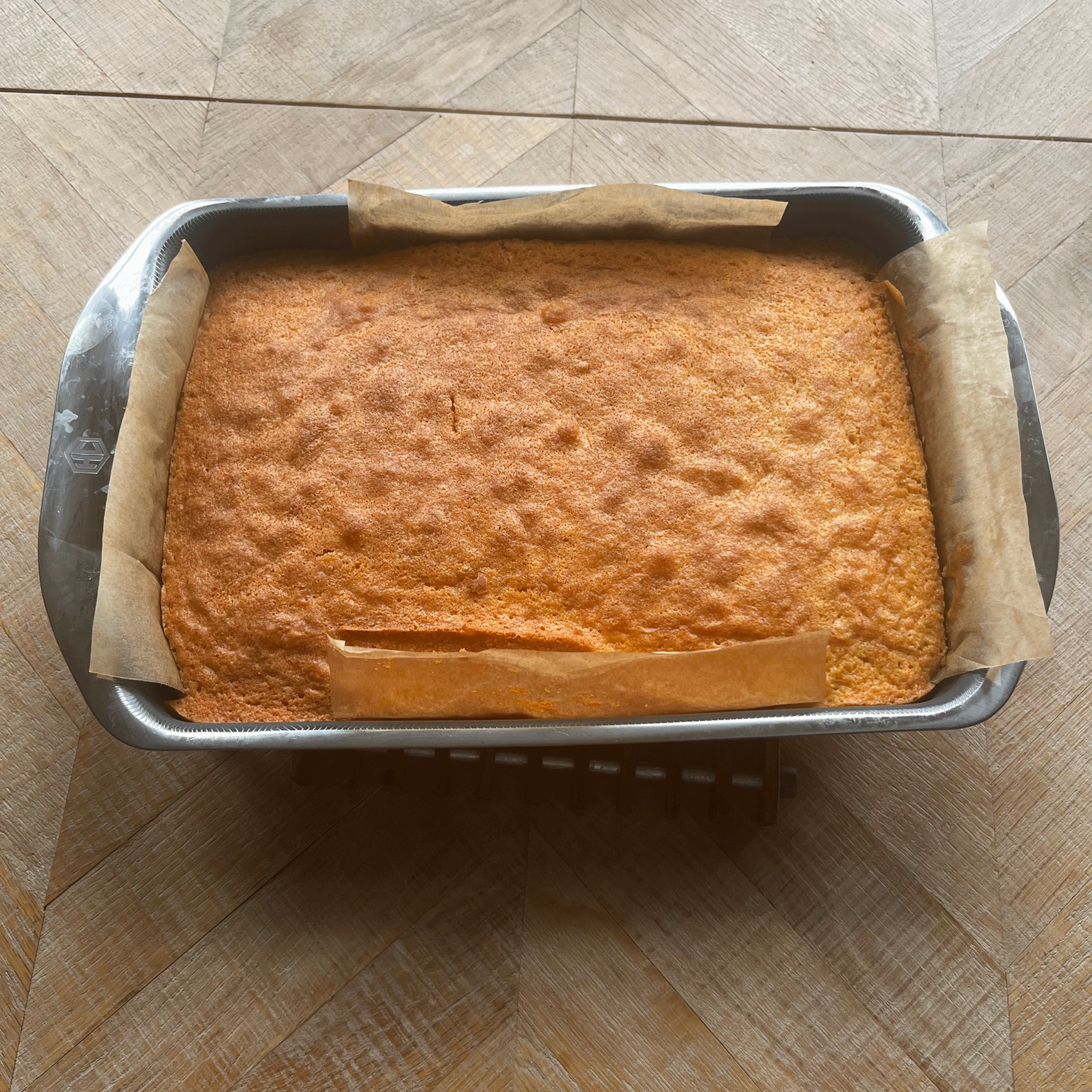 a freshly baked traybake in a HexClad baking tin