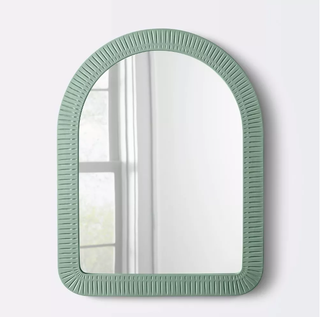 Sage green arched mirror.
