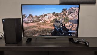 Toshiba 32LF2F53DB on TV unit with XBox Series X and controller