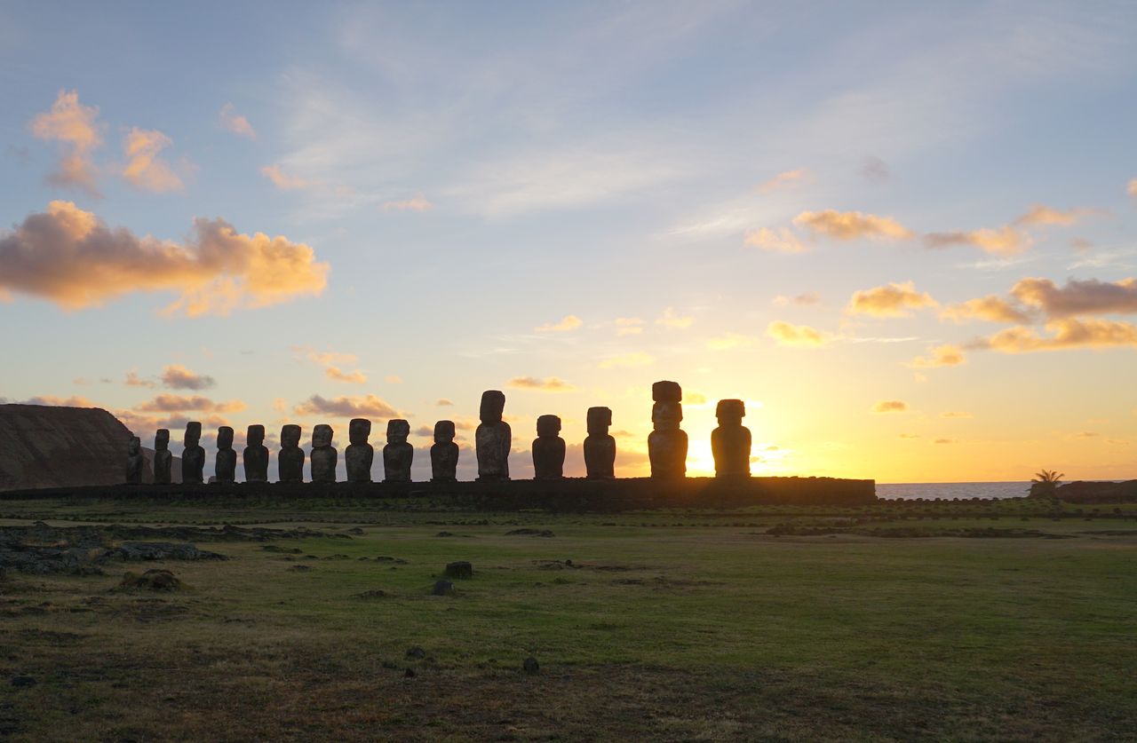 Another view of the Moai statues at the Tongariki site at sunrise.