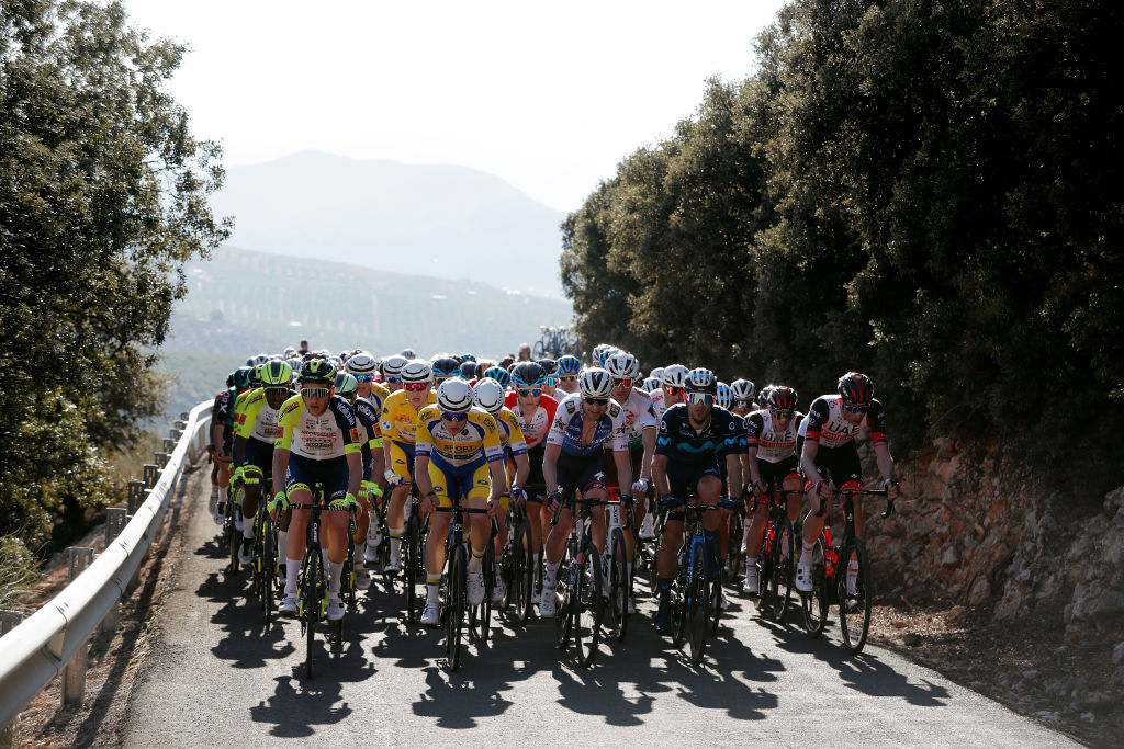 ALCALA LA REAL SPAIN FEBRUARY 17 LR Lindsay De Vylder of Belgium and Team Sport Vlaanderen Baloise Pieter Serry of Belgium and Team QuickStep Alpha Vinyl and Lluis Mas Bonet of Spain and Movistar Team lead The Peloton during the 68th Vuelta A Andalucia Ruta Del Sol 2022 Stage 2 a 1506km stage from Archidona to Alcal La Real 982m 68RdS on February 17 2022 in Alcala la Real Spain Photo by Bas CzerwinskiGetty Images