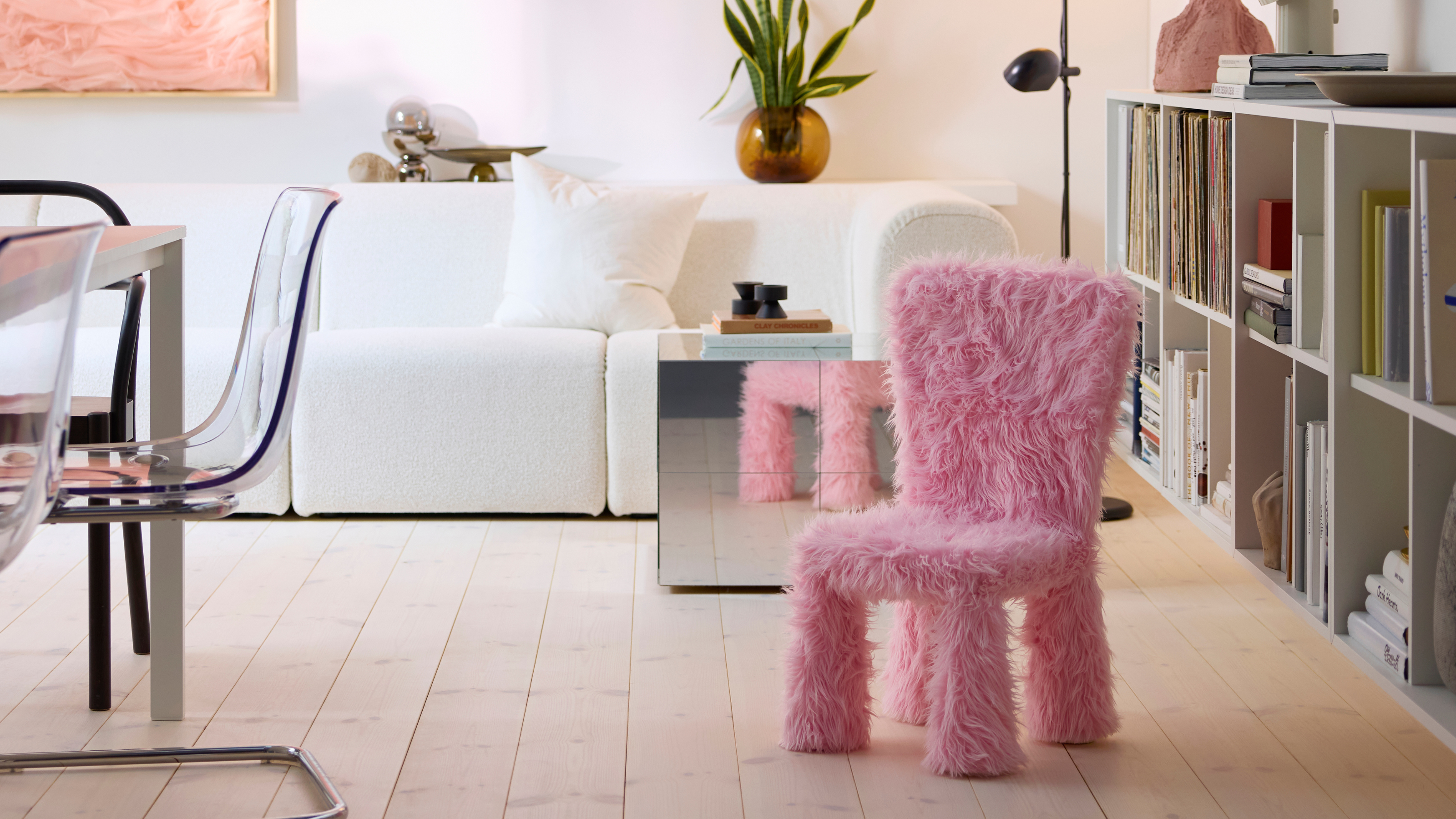 IKEA fluffy pink kids chair in a living room.