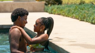 Michael Cooper Jr. and Lovie Simone as Justin and Keisha in a pool in Forever