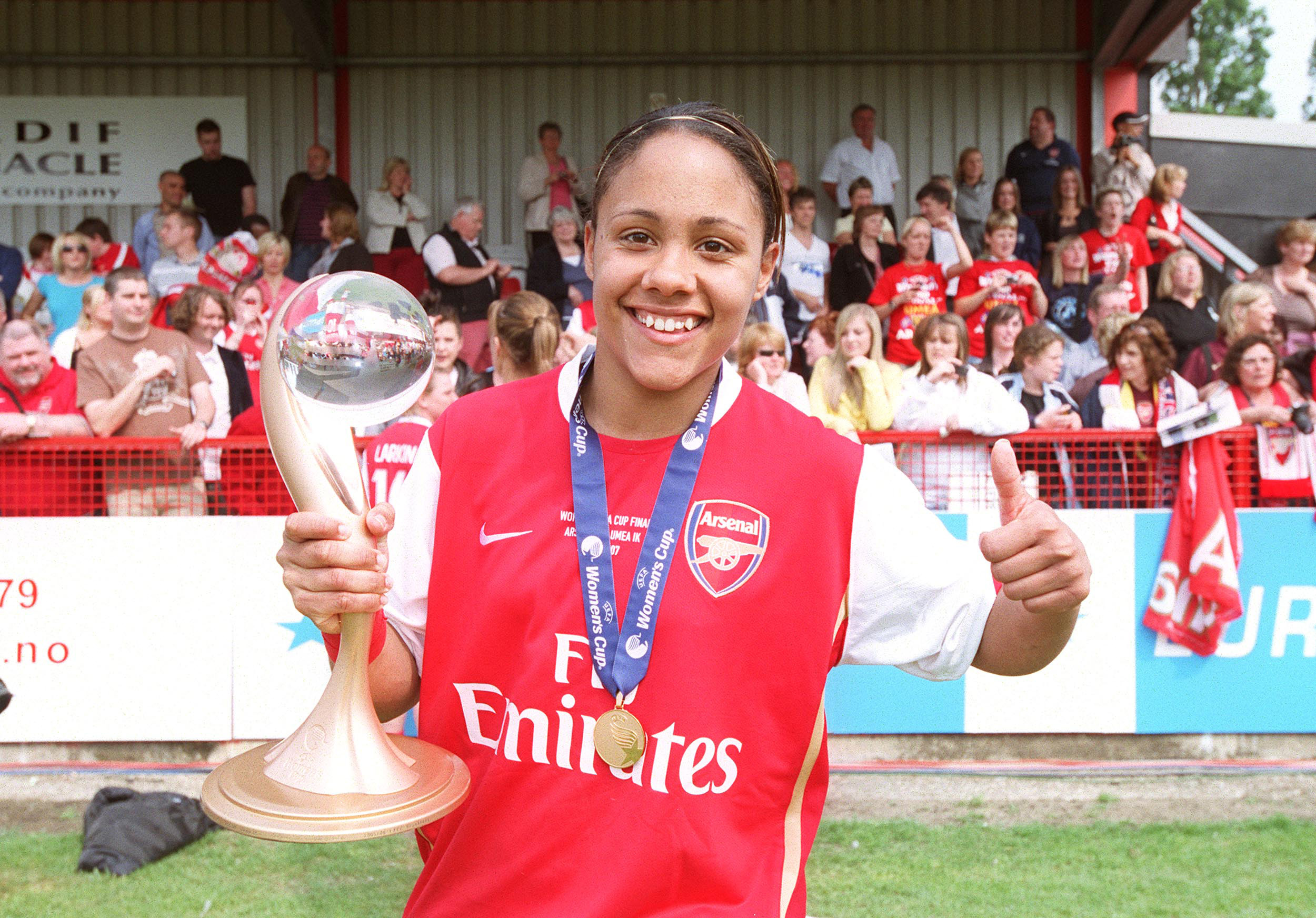 BOREHAMWOOD, ENGLAND - APRIL 29: Alex Scott of Arsenal with the Womens UEFA Cup Trophy after the Womens UEFA Cup Final 2nd leg Between Arsenal Women and Umea on April 29, 2007 in Borehamwood, England.