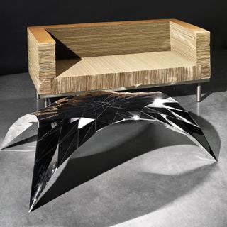 ‘Papel’ sofa in corrugated cardboard and chromium-plated stainless steel