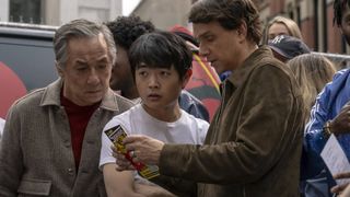 Jackie Chan as Mr Han, Ben Wang as Li Fong, and Ralph Macchio as Daniel LaRusso in Karate Kid: Legends