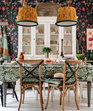 Kitchen wall decor ideas with bold wallpaper and dining table and chairs