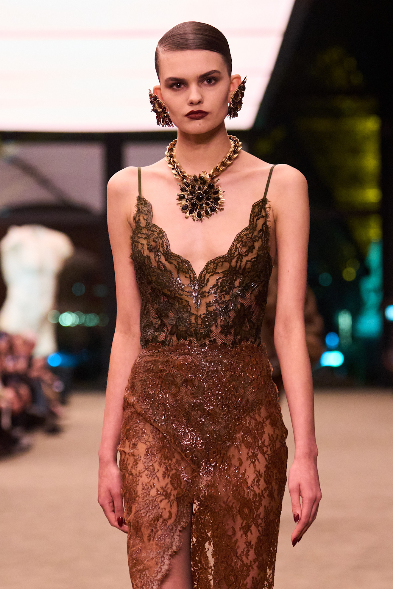 Saint Laurent fall/winter 2026 runway model wearing a fall jewelry trend.