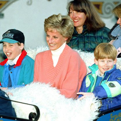 Princess Diana riding in a sleigh with Prince Harry and Prince William