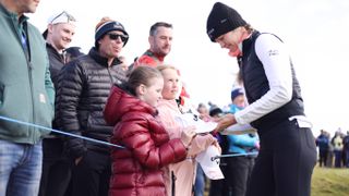 Nelly Korda signs autographs at the AIG Women's Open 2024