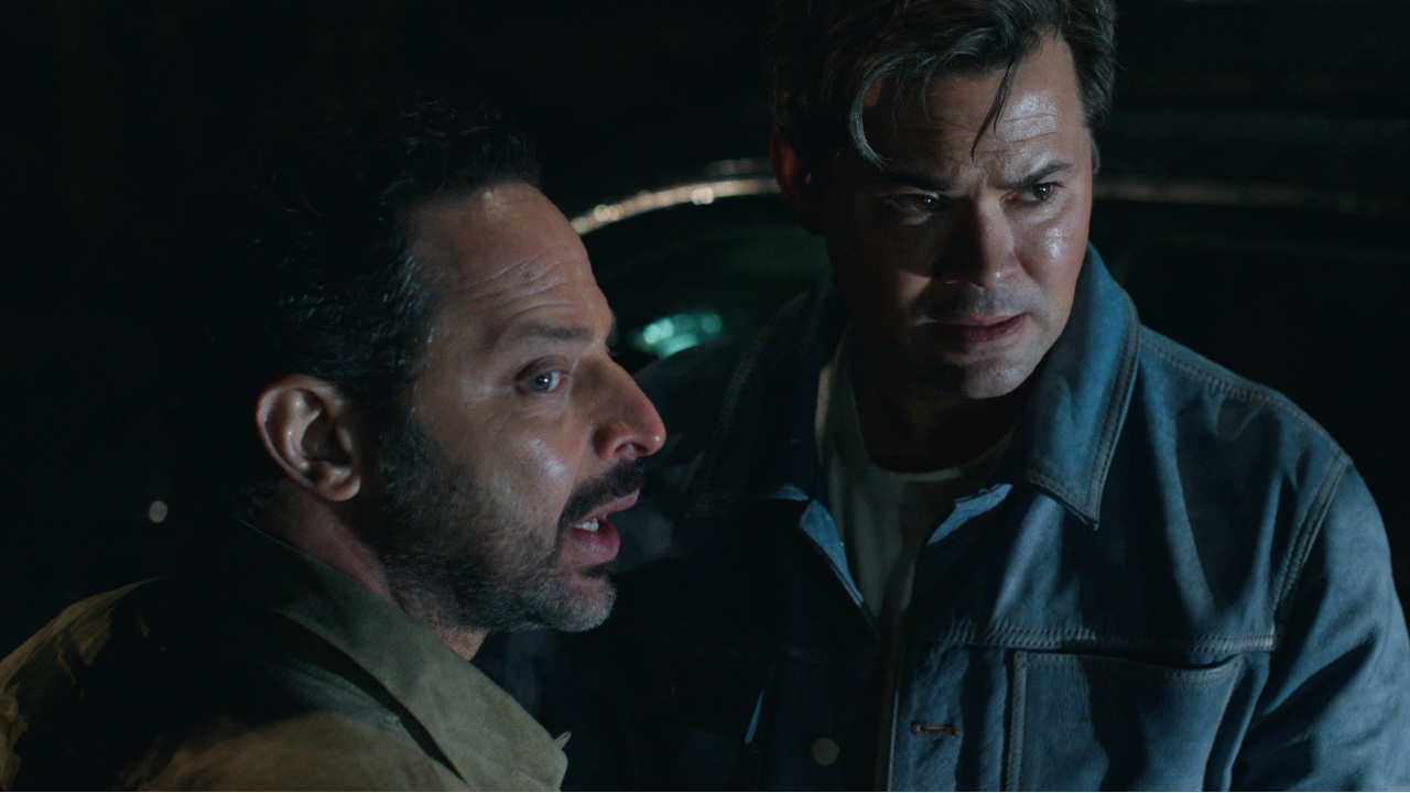From left to right: Nick Kroll turned to his right looked scared and Andrew Rannells looking spooked in I Don&#039;t Understand You. 