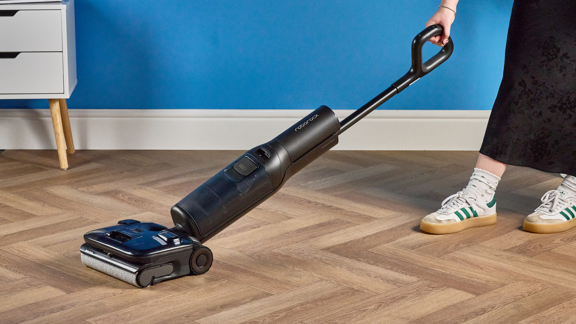 Roborock F25 ACE Pro photographed in front of a blue background