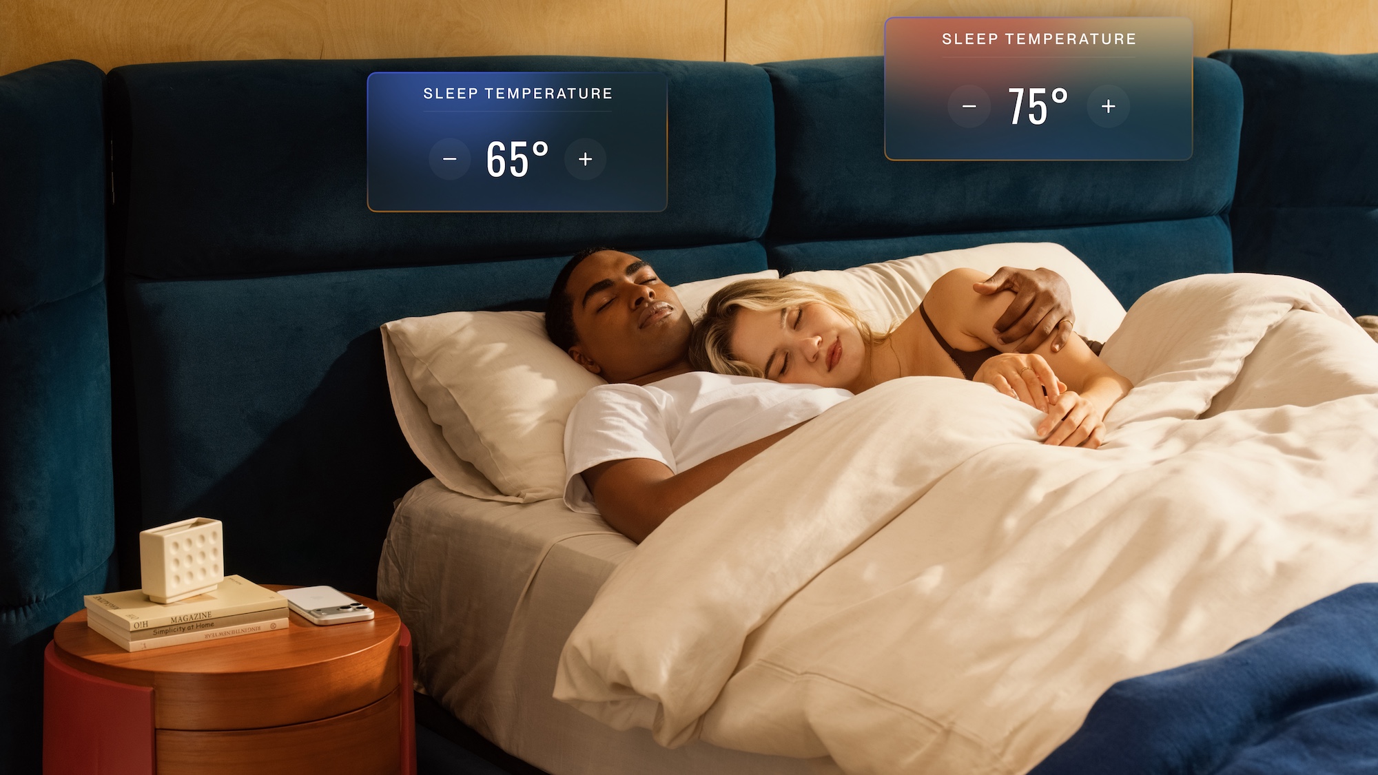 A man and woman sleep deeply on the Eight Sleep Pod 6 smart mattress cover, with one side programmed to 65 degrees Fahrenheit an the right side programmes to 75 degrees