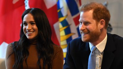 Prince Harry and Meghan, Duchess of Sussex smile during their visit to Canada House in thanks for the warm Canadian hospitality and support they received during their recent stay in Canada, on January 7, 2020 in London, England