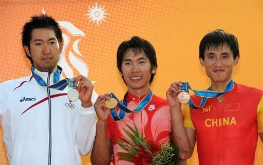 Men's cross country podium (l-r): Kohei Yamamoto (Japan), 2nd; Chun Hing Chan (Hong Kong, China), 1st; Zhiqiang Duan (People's Republic of China), 3rd