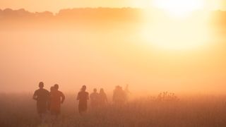 people watch the rising sun