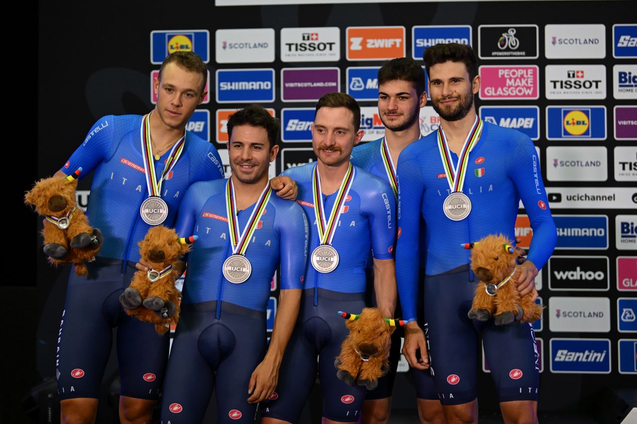 Italian team pursuit squad with silver medals