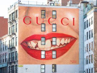 red lips on the side of a wall in New York City