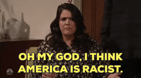 A concerned looking woman exclaims "Oh my God, I think America is racist."