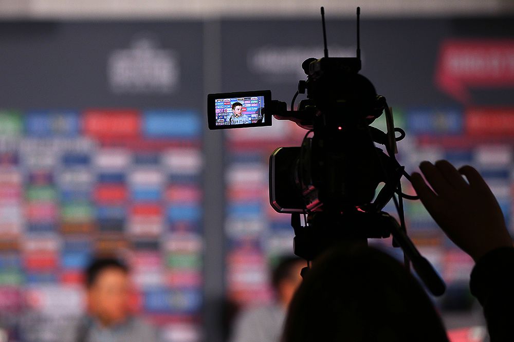 A video camera captures the scene at Wednesday's press conference