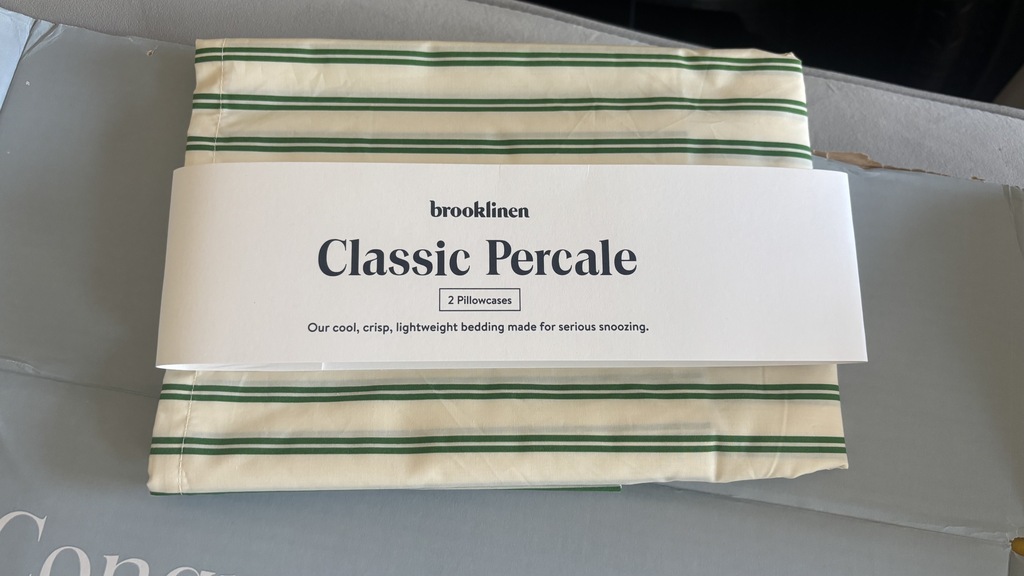 The Brooklinen Classic Percale Core Sheet Set in its packaging.