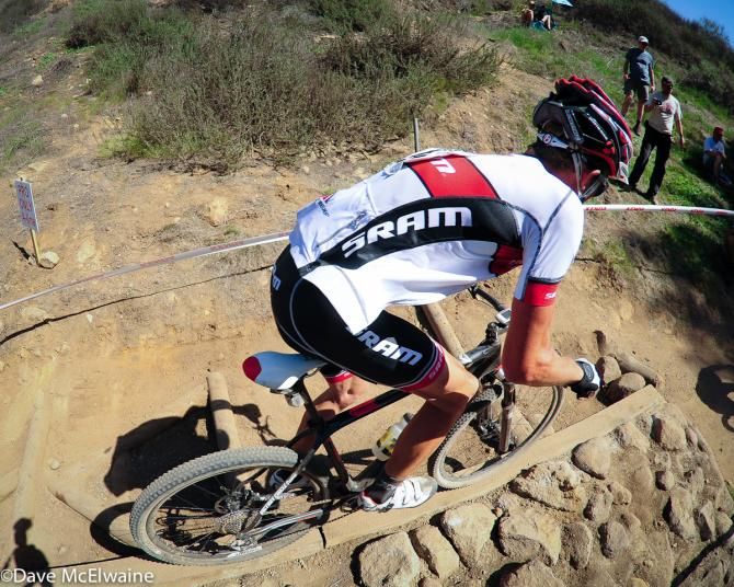 Russell Finsterwald (SRAM) riding a rail in the rock garden