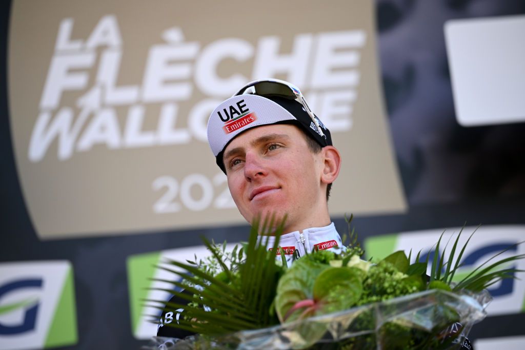 HUY BELGIUM APRIL 19 Tadej Pogaar of Slovenia and UAE Team Emirates celebrates at podium as race winner during the 87th La Fleche Wallonne 2023 Mens Elite a 1943km one day race from Herve to Mur de Huy UCIWT on April 19 2023 in Huy Belgium Photo by David StockmanGetty Images