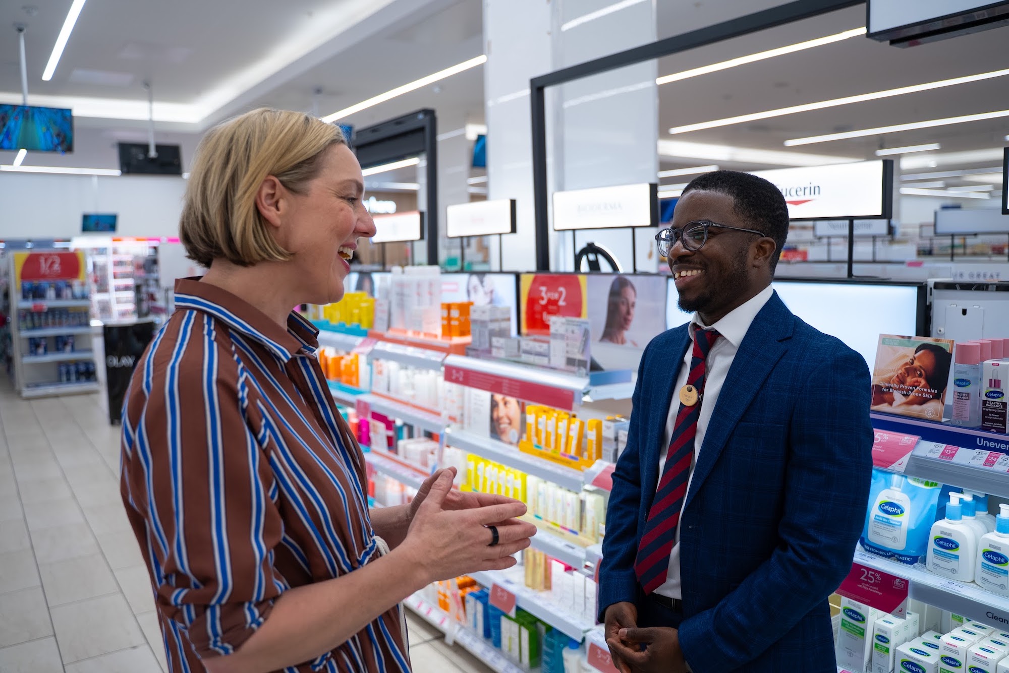 Dr Justine Hextall talking with Boots pharmacist