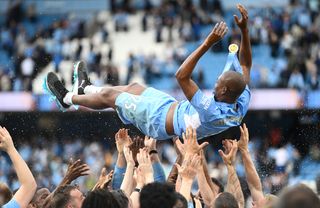 Fernandinho is thrown into the air by his Manchester City team-mates after his last game for the club, against Aston Villa in May 2022.
