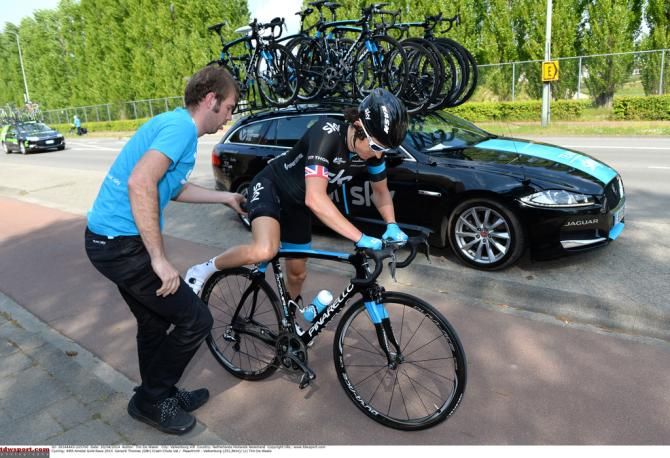 Geraint Thomas (Team Sky) gets back on his bike
