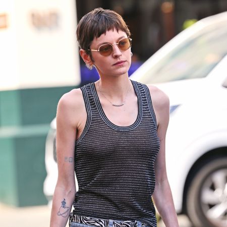 Emma Corrin wears a tank top in Portofino