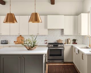 white kitchen with dark gray island