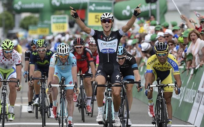 Matteo Trentin (Omega Pharma - QuickStep) salutes to victory after stage 6 at the Tour de Suisse